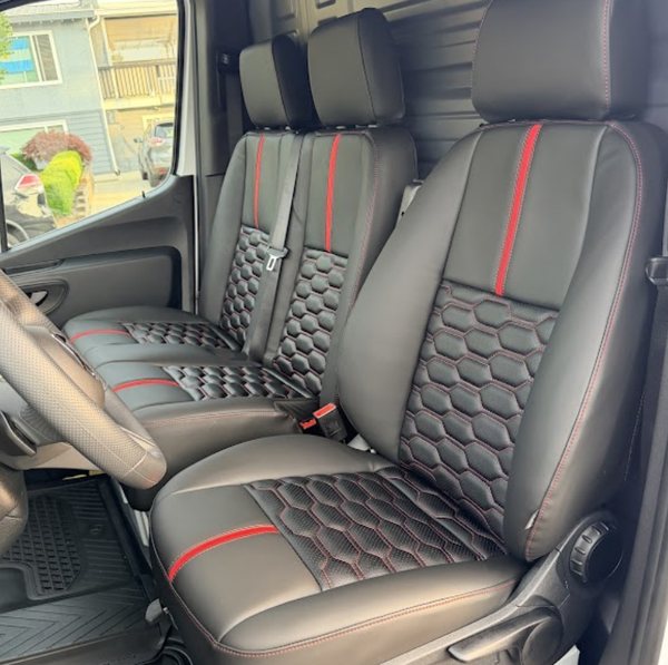 Black seat covers with red hex quilting and a red centre stripe fitted in a Mercedes-Benz Metris van